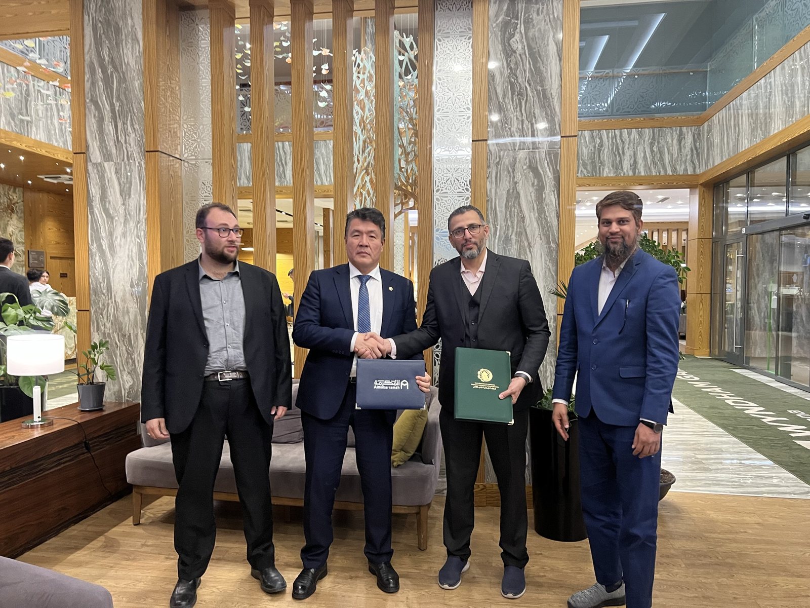 IOFS and Al Mukarramah teams after the MoU signing, June 2023